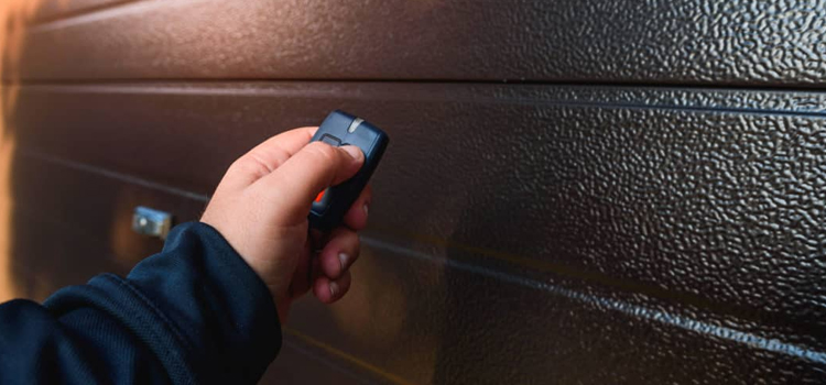 automatic door opener with remote control in Ives Estates