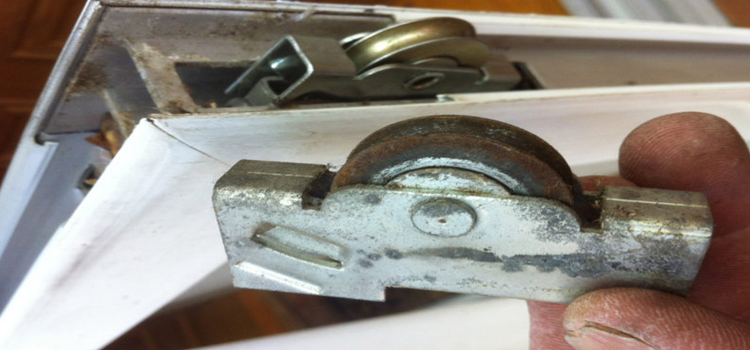 screen door roller repair in Ives Estates